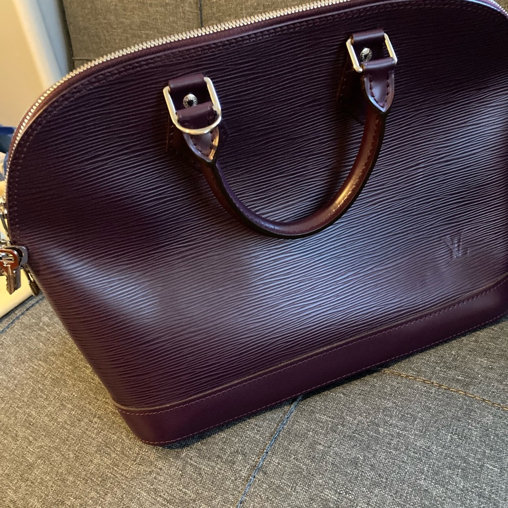 Authentic Louis Vuitton Burgundy Alma Leather Bag with Silver Lock